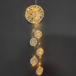 Artilady Love weaves dream catcher
