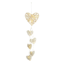 Artilady Love weaves dream catcher