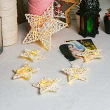 Artilady Love weaves dream catcher